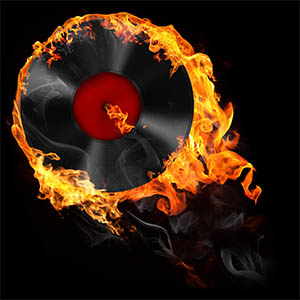 16415362 – illustration of analog vinyl record in fire on the black background